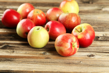 Apples on brown wooden background