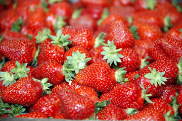 Freshly picked strawbewrries on market stall