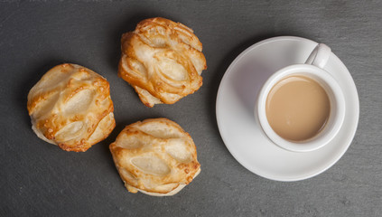 Bread Roll with cottage cheese filling and coffe close up