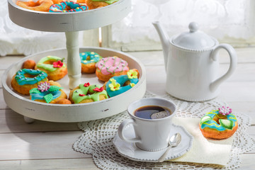 Sweet and tasty donuts with colorful decoration