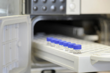 Close-up empty laboratory glass flasks in medicine cartridge