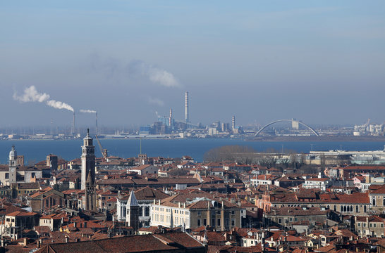 smokestacks and factories polluting with smoke
