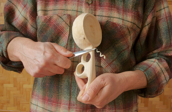 carving a wooden cup