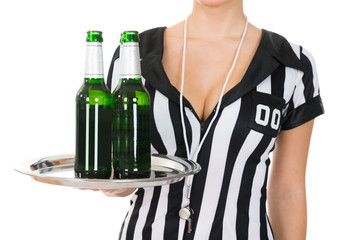 Close-up Of Referee Holding Drinks
