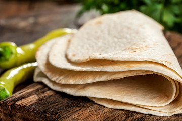  Tortillas on a wooden table