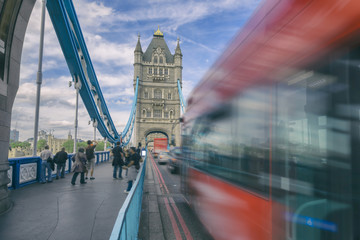 London street scene - bus speeding along bridge