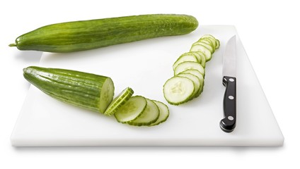 Cucumber and slices on a white background