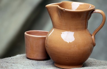 Old ceramic and glass jug in medieval style