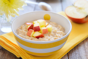 Healthy breakfast - oatmeal porridge with apples
