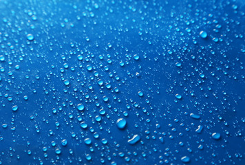 Water drops on blue background