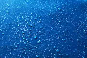 Water drops on blue background