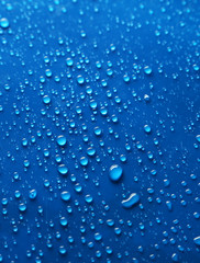 Water drops on blue background