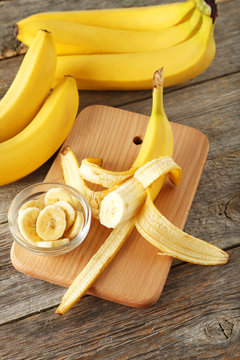 Bananas on grey wooden background