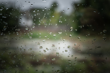 Drops of rain on glass with filter effect retro vintage style