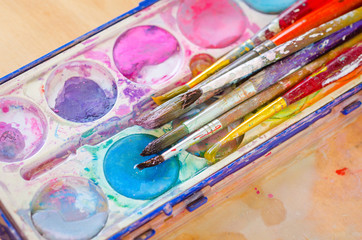 Obraz premium palette with watercolor ink and brush