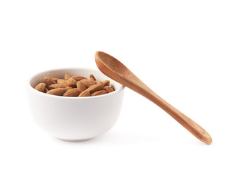 Bowl full of almond seeds isolated