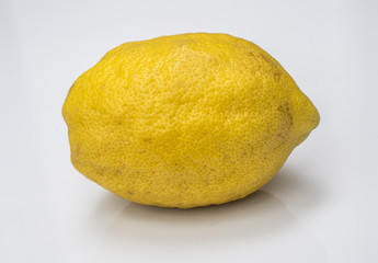 Yellow lemon on a white background