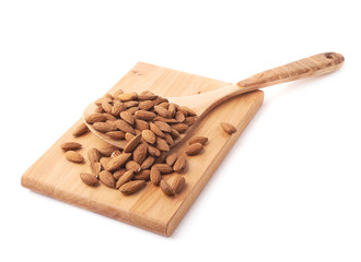 Wooden spoon covered with almonds