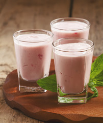 Fresh homemade yogurt berries in glasses, selective focus