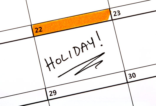 Holiday Date Written on a Calendar