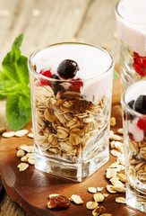 Healthy breakfast with muesli, homemade yogurt and berries, sele