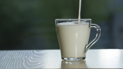 Milk, breastmilk,pour, shed,blur.