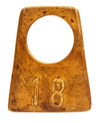 Ancient brass cloakroom label with number 18