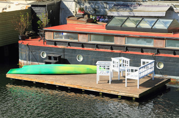 Fototapeta na wymiar House barge with mooring. Copenhagen, Denmark