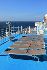 Chaise-longue on deck  of ruise liner