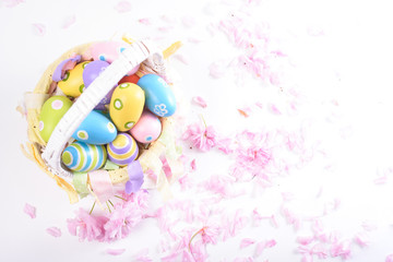 Colorful easter eggs in a basket