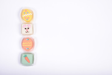 Vertical part of the frame made from small Easter cakes