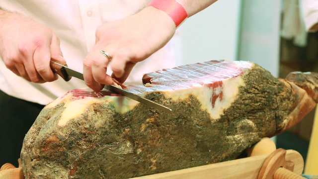 Cutting the Croatian Dry Ham