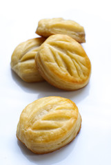 Piece of apple pie isolated on white background