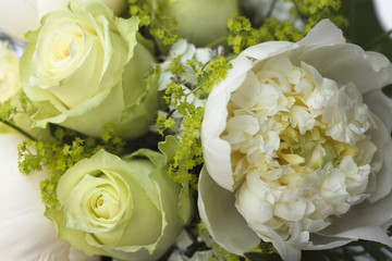 Detail of small bouquet with white roses for bride or bridesmaid