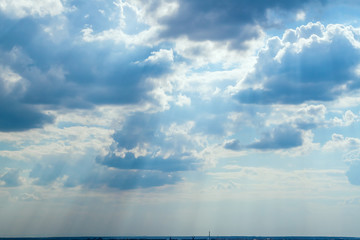 cloudy sky with sun rays