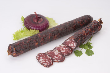 Composition of the smoked sausages and vegetables.