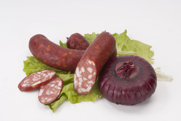 Composition of the smoked sausages and vegetables.