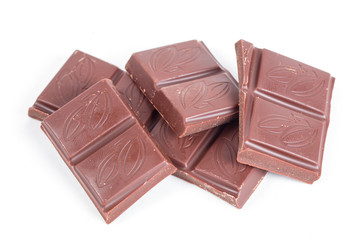 Chocolate pieces isolated on white background