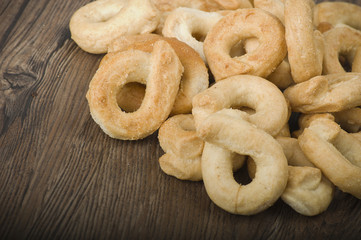 Taralli on the wood table,Traditional Italian snack from Puglia