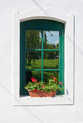 Plakat Window with geranium