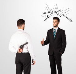 Businessman hiding a weapon