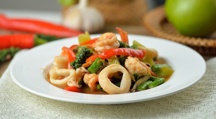 stir fried squid with chilli and basil isolated on white