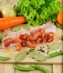 Strips of fried bacon