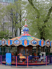 children's carousel with horses