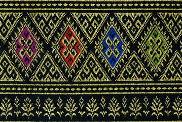 Texture of Thai style golden braid fabric pattern