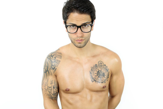 shirtless young man with glasses