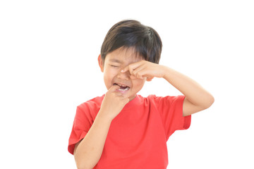 歯痛を訴える男の子 