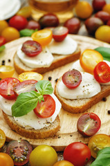 Fototapeta na wymiar sandwich with tomatoes, Basil and mozzarella