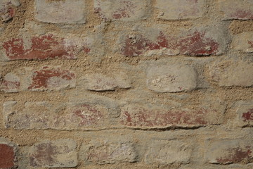 Dirty red brick wall