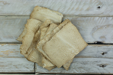 Old paper on wooden planks